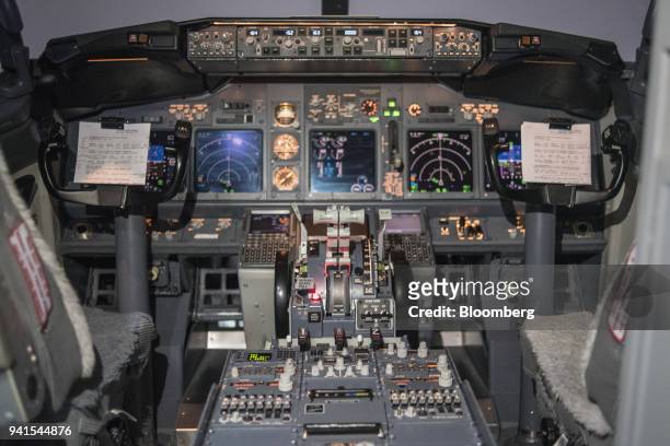 The control panel of a flight simulator is seen during a tour of the new Leadership Education and Aircraft Development Center in the Wings building...