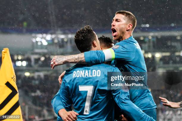 Real Madrid forward Cristiano Ronaldo celebrates with his teammates after scoring his goal during the Uefa Champions League Round of 16 football...