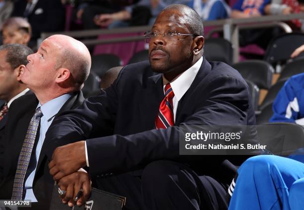 Assistant coach Patrick Ewing of the Orlando Magic observes from the bench during the game against the New York Knicks on November 29, 2009 at...