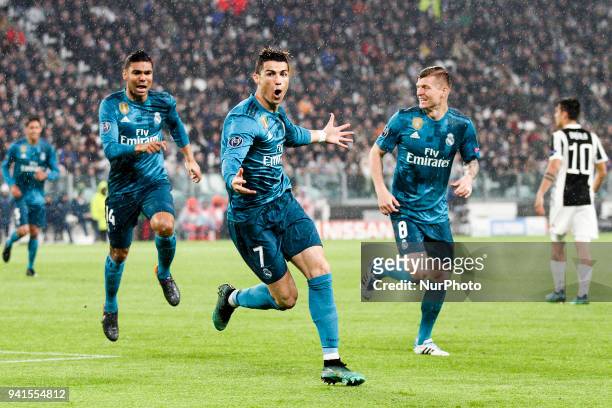 Real Madrid forward Cristiano Ronaldo celebrates after scoring his goal during the Uefa Champions League Round of 16 football match JUVENTUS - REAL...