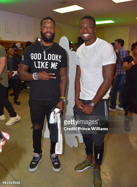 Brandon Lafell and AJ Green attend Huncho Day Celebrity Flag Football "Team Huncho vs Team Julio" on April 1, 2018 in Lawrenceville, Georgia.