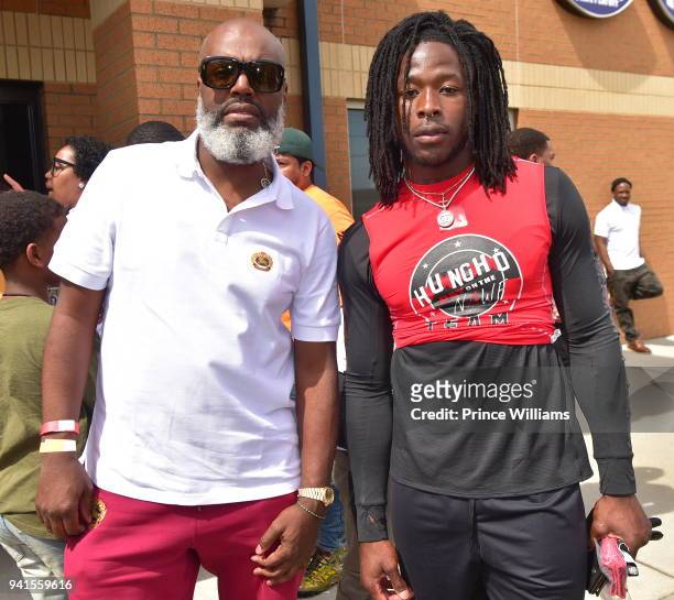 Alvin Kamara and Kevin 'Coach K' Lee attend Huncho Day Celebrity Flag Football "Team Huncho vs Team Julio" on April 1, 2018 in Lawrenceville, Georgia.