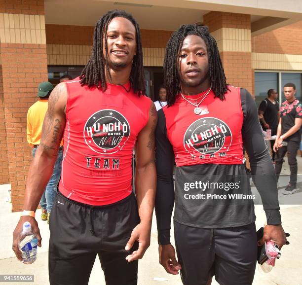 Todd Gurley and Alvin Kamara attend Huncho Day Celebrity Flag Football "Team Huncho vs Team Julio" on April 1, 2018 in Lawrenceville, Georgia.