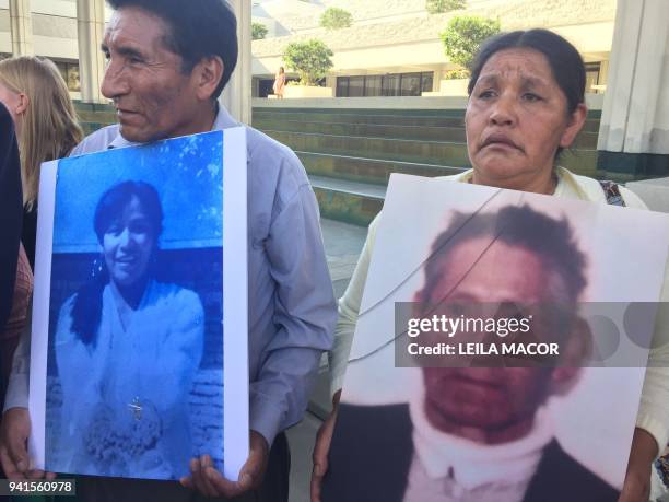 Teofilo Balcazar Cerro and Felicidad Rosa Huancar , Bolivian plaintiffs from the Aymara community talk to the press outside a federal court on April...