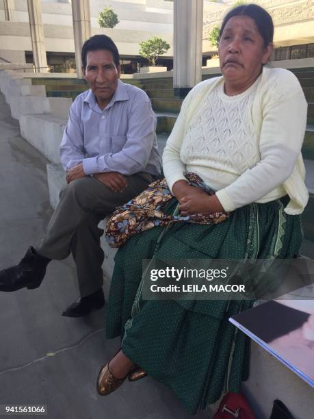 Teofilo Balcazar Cerro and Felicidad Rosa Huancar , Bolivian plaintiffs from the Aymara community talk to the press outside a federal court on April...