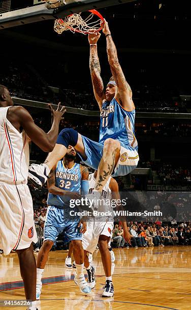 Chris Andersen of the Denver Nuggets dunks against the Charlotte Bobcats on December 8, 2009 at the Time Warner Cable Arena in Charlotte, North...