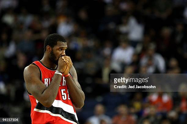 Greg Oden of the Portland Trail Blazers looks on against the Golden State Warriors during an NBA game at Oracle Arena on November 20, 2009 in...