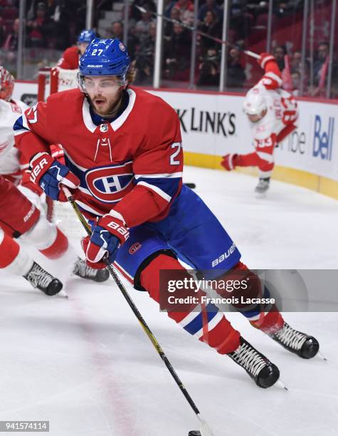 Alex Galchenyuk of the Montreal Canadiens skates with the puck against the Detroit Red Wings in the NHL game at the Bell Centre on March 26, 2018 in...