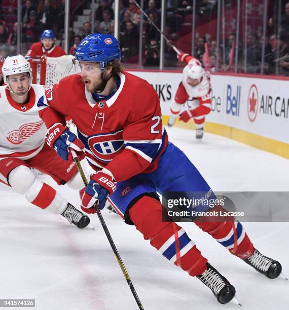 Alex Galchenyuk of the Montreal Canadiens skates with the puck against the Detroit Red Wings in the NHL game at the Bell Centre on March 26, 2018 in...