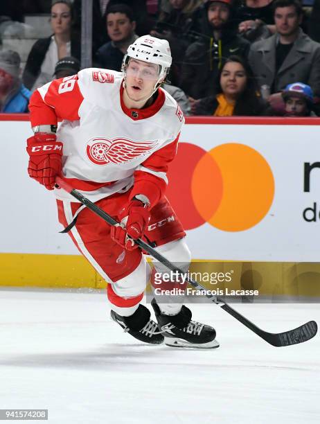 Tyler Bertuzzi of the Detroit Red Wings skates with the puck against the Montreal Canadiens in the NHL game at the Bell Centre on March 26, 2018 in...