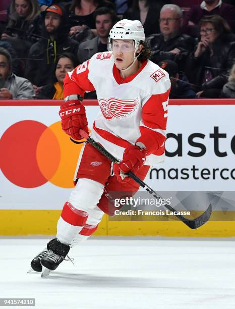 Tyler Bertuzzi of the Detroit Red Wings skates with the puck against the Montreal Canadiens in the NHL game at the Bell Centre on March 26, 2018 in...