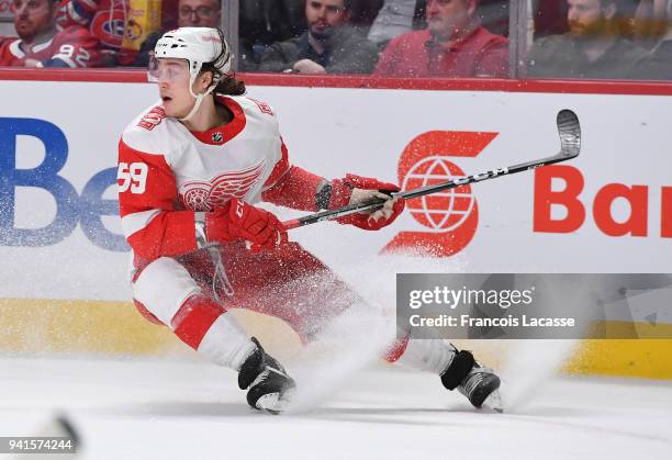 Tyler Bertuzzi of the Detroit Red Wings skates with the puck against the Montreal Canadiens in the NHL game at the Bell Centre on March 26, 2018 in...