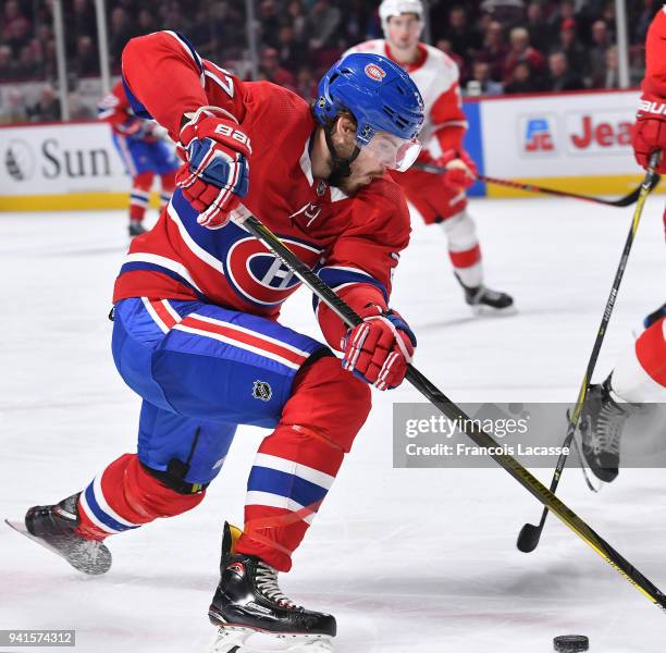 Alex Galchenyuk of the Montreal Canadiens controls the puck against the Detroit Red Wings in the NHL game at the Bell Centre on March 26, 2018 in...