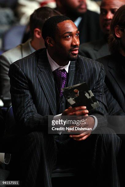 Gilbert Arenas of the Washington Wizards sits during a memorial to late Washington Wizards owner Abe Pollin at the Verizon Center on December 8, 2009...