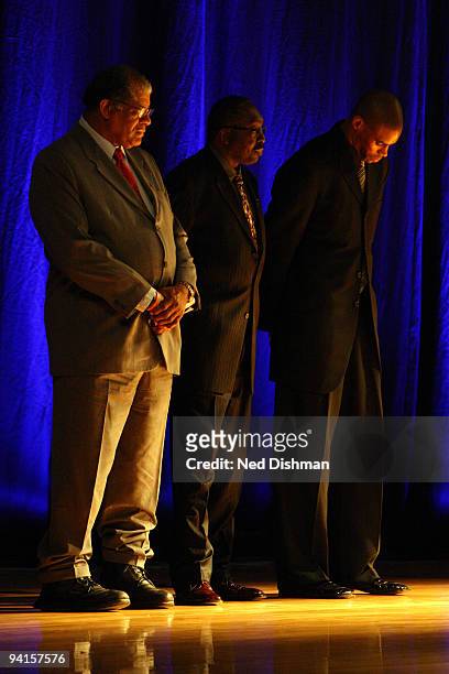 Legends Wes Unseld and Earl Monroe along with Antawn Jamison of the Washington Wizards wait prior to speaking during a memorial to late Washington...