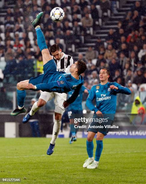 Cristiano Ronaldo of Real Madrid scores his team's second goal during the UEFA Champions League Quarter Final Leg One match between Juventus and Real...