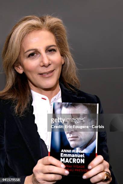 Journalist Anne Fulda poses during Paris Book Fair 2018 at Parc Des Expositions Porte de Versailles, France on .