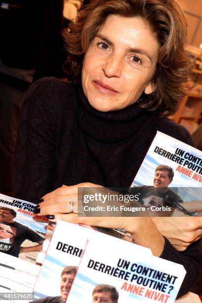 Reporter Anne Nivat poses during Paris Book Fair 2018 at Parc Des Expositions Porte de Versailles, France on .