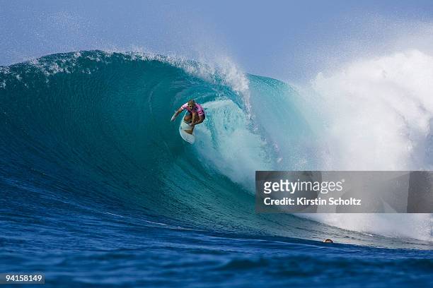 Stephanie Gilmore of Australia surfs inside the barrel to score a near perfect ride winning her round three heat at the Billabong Pro Maui on...