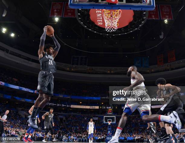 Rondae Hollis-Jefferson of the Brooklyn Nets grabs the rebound against the Philadelphia 76ers at Wells Fargo Center on April 3, 2018 in Philadelphia,...