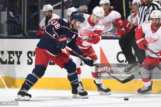 Boone Jenner of the Columbus Blue Jackets skates with the puck during the first period of a game against the Detroit Red Wings on April 3, 2018 at...