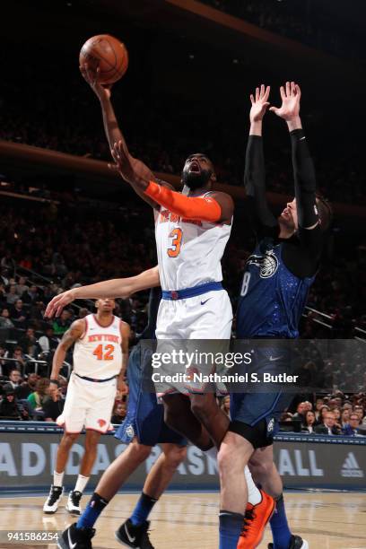 Tim Hardaway Jr. #3 of the New York Knicks goes to the basket against the Orlando Magic on April 3, 2018 at Madison Square Garden in New York City,...