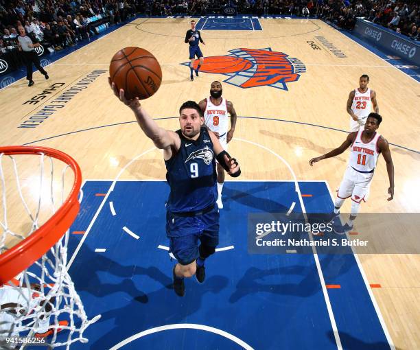 Nikola Vucevic of the Orlando Magic goes to the basket against the New York Knicks on April 3, 2018 at Madison Square Garden in New York City, New...