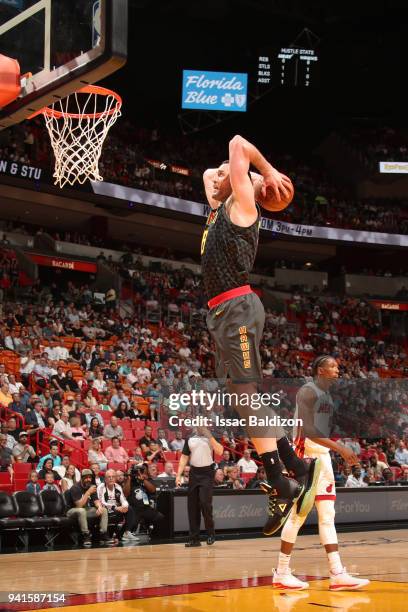 Miles Plumlee of the Atlanta Hawks goes to the basket against the Miami Heat on April 3, 2018 at American Airlines Arena in Miami, Florida. NOTE TO...