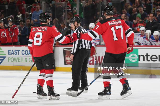 Will Butcher and Patrick Maroon of the New Jersey Devils celebrate Butcher's first-period goal during the game against the New York Rangers at...