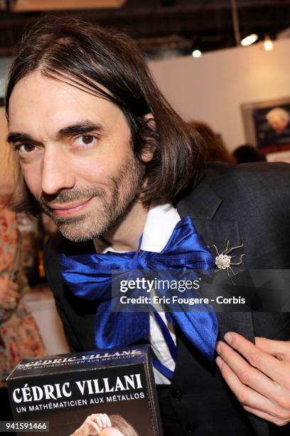 Mathematician and Politician Cedric Villani poses during Paris Book Fair 2018 at Parc Des Expositions Porte de Versailles, France on .