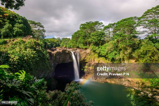 rainbow falls - rainbow waterfall stock pictures, royalty-free photos & images