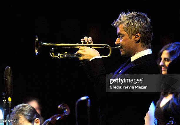 Chris Botti performs with Sting during A Winter's Night.. Live from the Cathedral Church of Saint John the Divine on December 8, 2009 in New York...