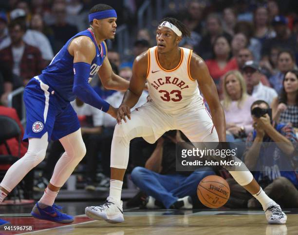 Tobias Harris of the Los Angeles Clippers guards Myles Turner of the Indiana Pacers at Staples Center on April 1, 2018 in Los Angeles, California....