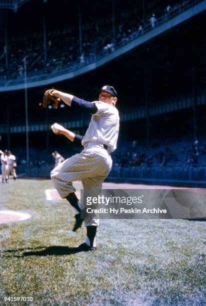 Mickey Mantle of the New York Yankees throws the ball prior to an MLB game against the Chicago White Sox on May 18, 1955 at Yankee Stadium in the...