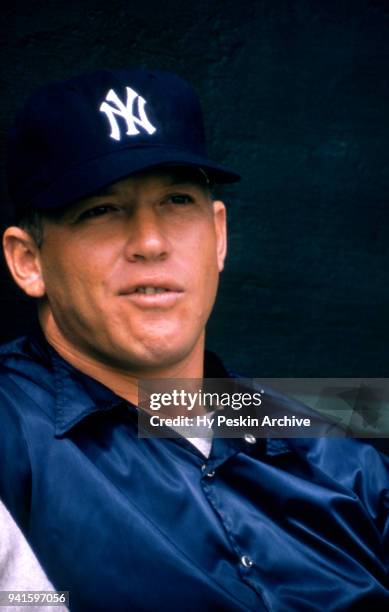 Mickey Mantle of the New York Yankees sits on the bench during Spring Training circa March, 1957 in Florida.