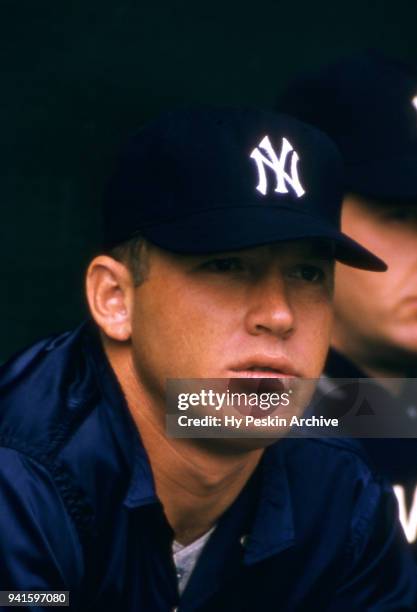 Mickey Mantle of the New York Yankees sits on the bench during Spring Training circa March, 1957 in Florida.