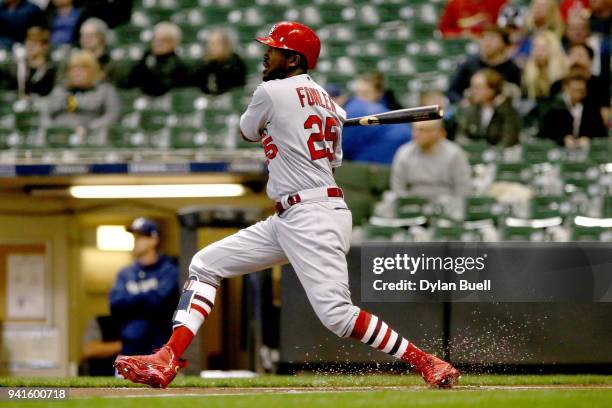 Dexter Fowler of the St. Louis Cardinals hits a home run in the first inning against the Milwaukee Brewers at Miller Park on April 3, 2018 in...