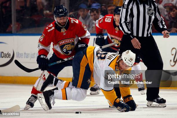 Ryan Hartman of the Nashville Predators faces off against Vincent Trocheck of the Florida Panthers at the BB&T Center on April 3, 2018 in Sunrise,...