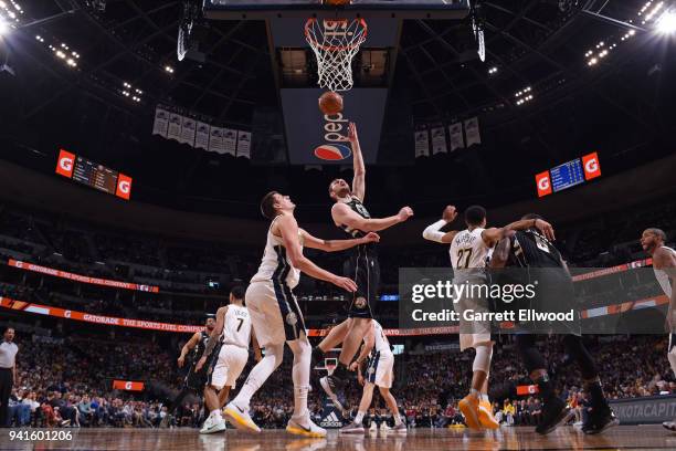 Tyler Zeller of the Milwaukee Bucks handles the ball against the Denver Nuggets on April 1, 2018 at the Pepsi Center in Denver, Colorado. NOTE TO...