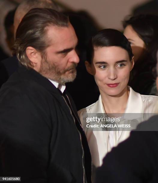 Joaquin Phoenix and Rooney Mara attend the New York special screening of Amazon Studios' "You Were Never Really Here" at Metrograph on April 3, 2018...