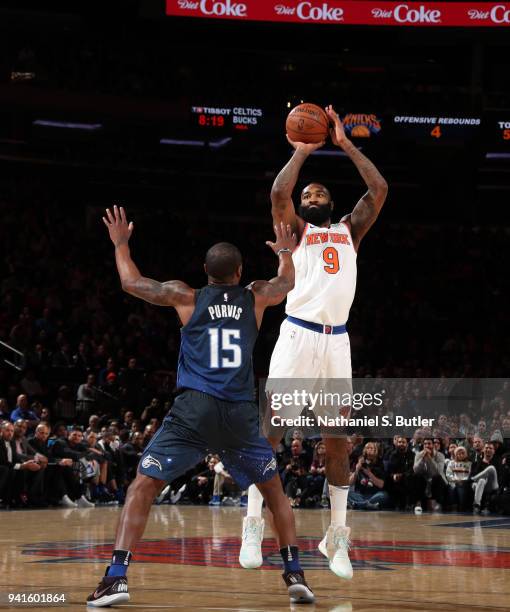 Kyle O'Quinn of the New York Knicks shoots the ball against the Orlando Magic on April 3, 2018 at Madison Square Garden in New York City, New York....