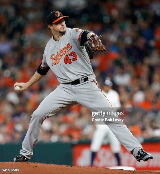 Mike Wright of the Baltimore Orioles throws in the first inning against the Houston Astros at Minute Maid Park on April 3, 2018 in Houston, Texas.