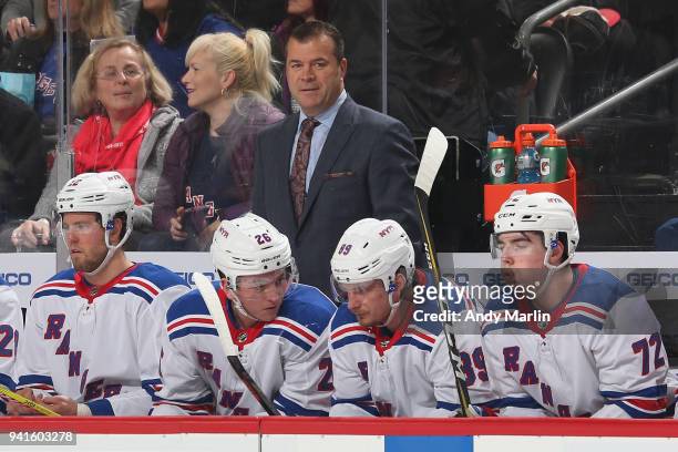 Head Coach Alain Vigneault of the New York Rangers looks on during the game against the New Jersey Devils at Prudential Center on April 3, 2018 in...
