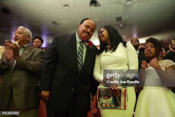 Martin Luther King III the son of Martin Luther King, Jr., stands with his wife Arndrea Waters King and daughter Yolanda Renee King before he speaks...