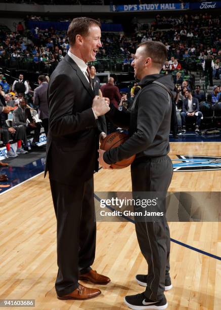 Head coach Terry Stotts of the Portland Trail Blazers talks to J.J. Barea of the Dallas Mavericks during the game on April 3, 2018 at the American...