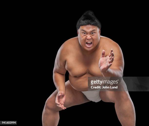 sumo wrestler intimidation - american sumo stock-fotos und bilder