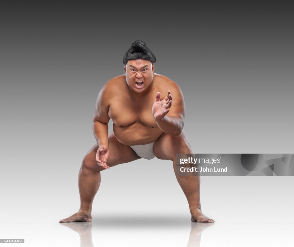 A Sumo Wrestler Prepares To Wrestle The Viewer