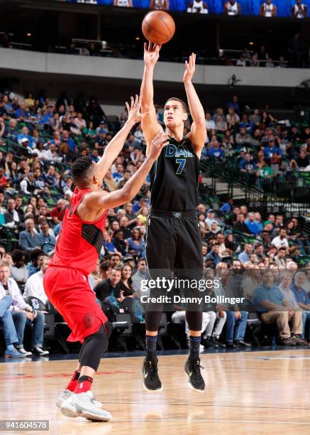 Dwight Powell of the Dallas Mavericks shoots the ball against the Portland Trail Blazers on April 3, 2018 at the American Airlines Center in Dallas,...