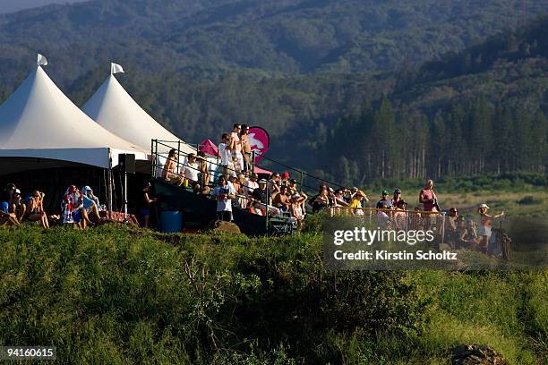 The crowd watches all the action from the grand stand on the cliff above the bay at the Billabong Pro Maui on December 8, 2009 in Honolua Bay, Maui,...