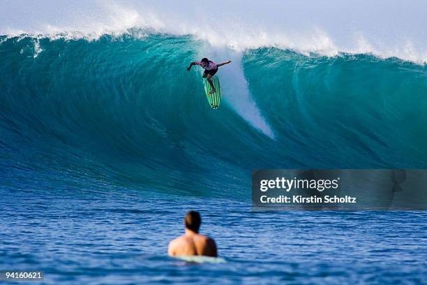 Silvana Lima of Brasil drops into a wave at the Billabong Pro Maui on December 8, 2009 in Honolua Bay, Maui, Hawaii.